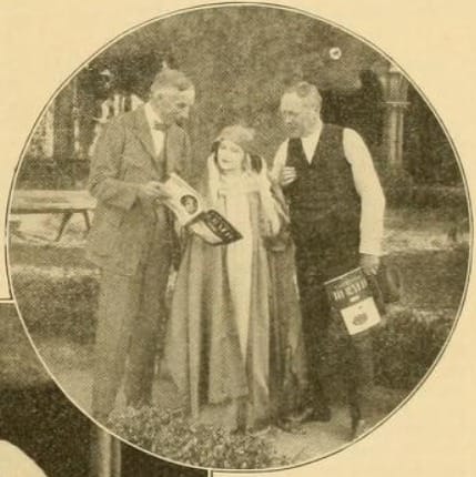 Phillip Rand meets with actress Viola Dana and director George D. Baker.