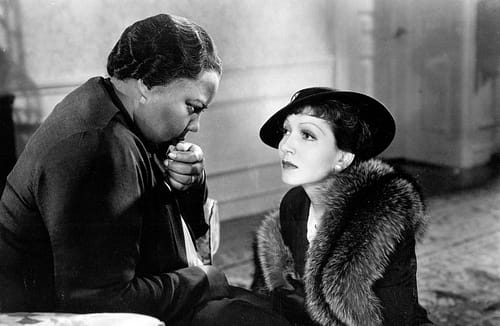 Louise Beaver and Claudette Colbert in Imitation of Life.