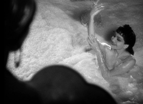 Claudette Colbert bathing in goat's milk in The Sign of the Cross