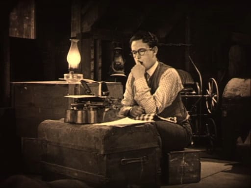 Harold Lloyd at a typewriter in 1924's Girl Shy a.k.a. me struggling to write about why I love film.
