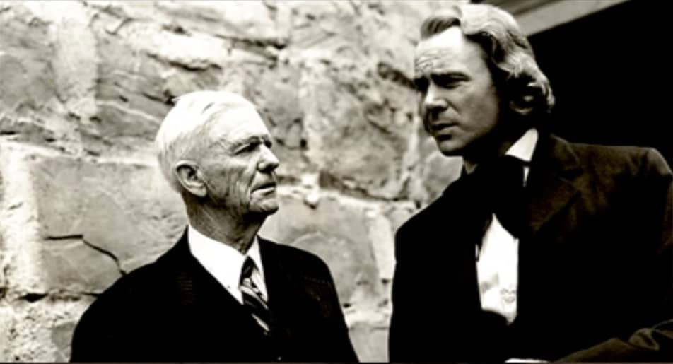 Dean Jagger in costume as Brigham Young with George Pyper.