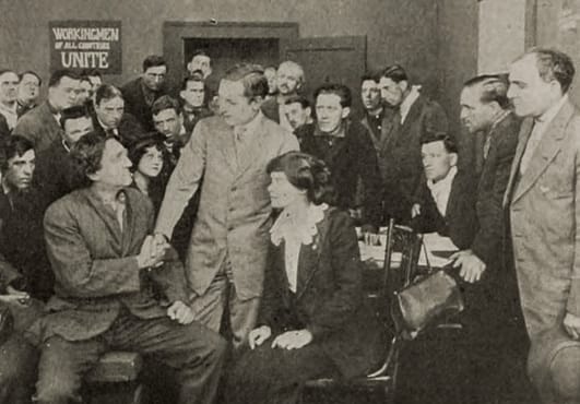 A packed meeting of workingmen in the lost silent film 1914 The Jungle.